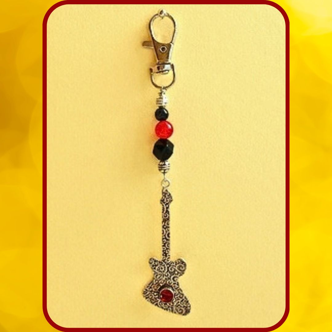 Bijou de sac Guitare avec du Grenat